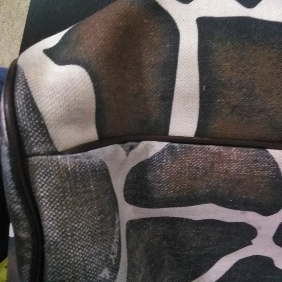 Used Dooney & Bourne Giraffe print handbag. - Picture 9 of 12